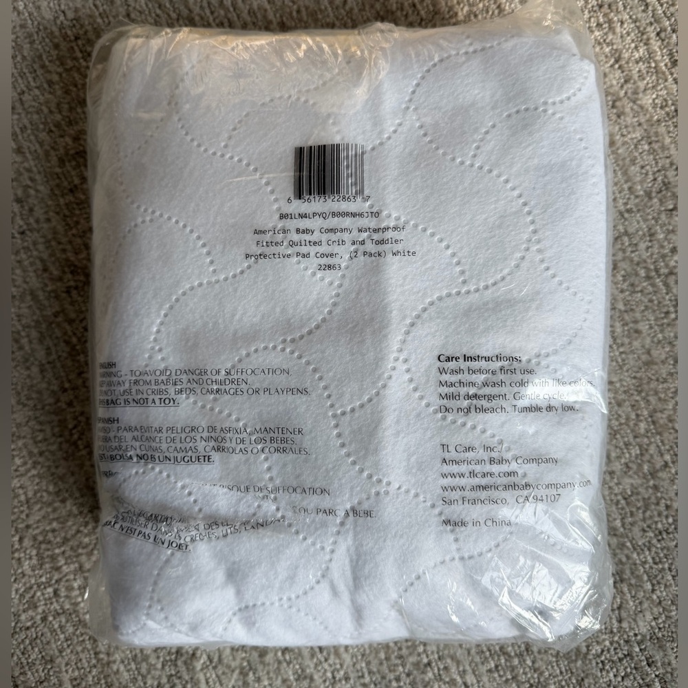 White Quilted Crib Pad (set of 2)